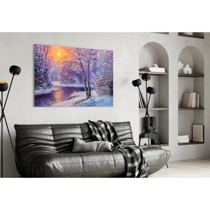Vibrant winter sunset glass wall art with orange sun and snow trees