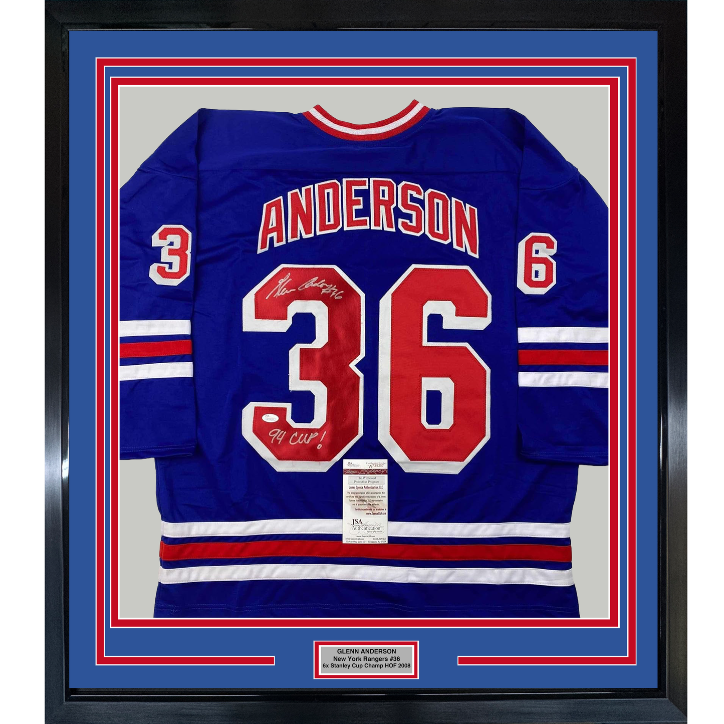 Framed blue New York Rangers hockey jersey number 36 with "Anderson" nameplate, signed in silver pen, displayed against red and white striped matting with JSA authentication certificate.
