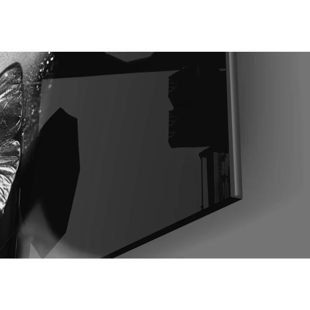 Sleek black-framed glass wall art mirror with metallic edge