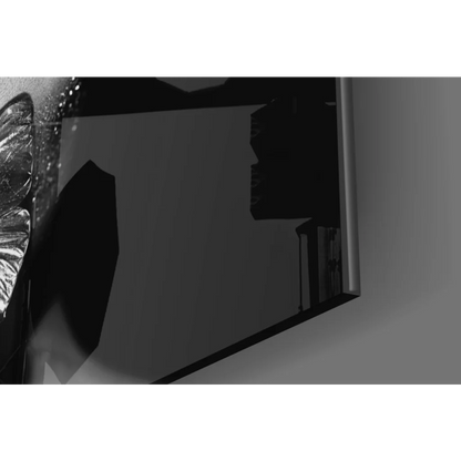 Sleek black-framed glass wall art mirror with metallic edge