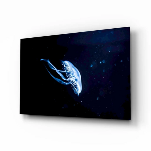 Glowing blue jellyfish glass wall art with starry ocean depths