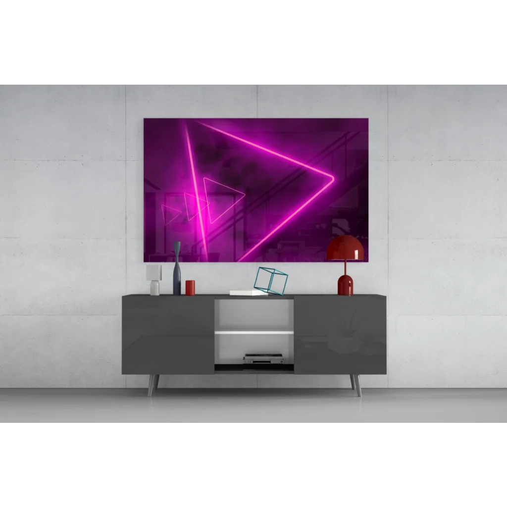 Vibrant neon pink glowing triangle glass wall art in electric purple pink