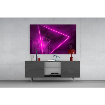 Vibrant neon pink glowing triangle glass wall art in electric purple pink