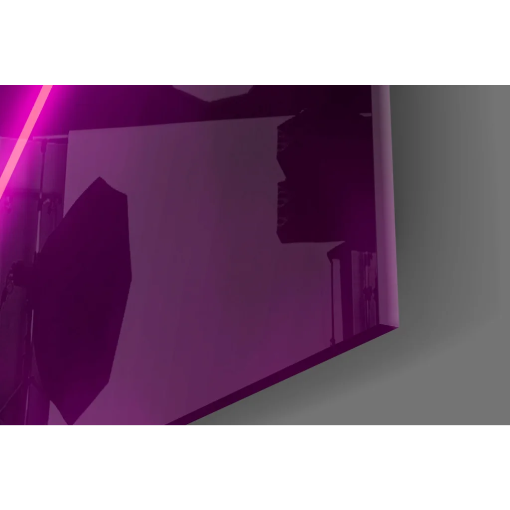 Glowing neon triangle glass wall art in electric purple pink lighting a studio backdrop
