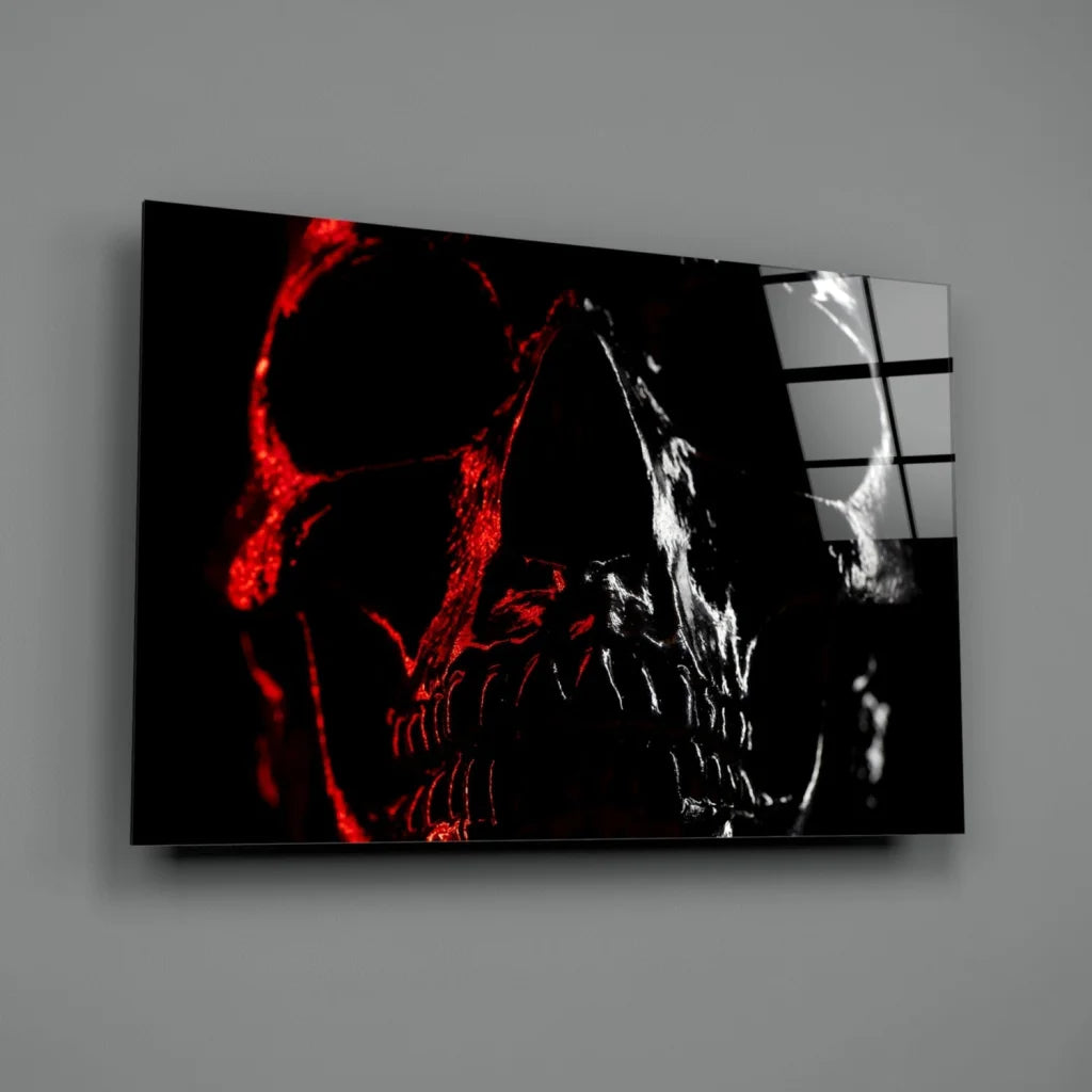 Glowing red skull wall art with crimson bone details on gray wall
