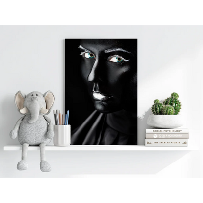 Black-and-white portrait canvas of woman with glowing teal eyes and silver accents