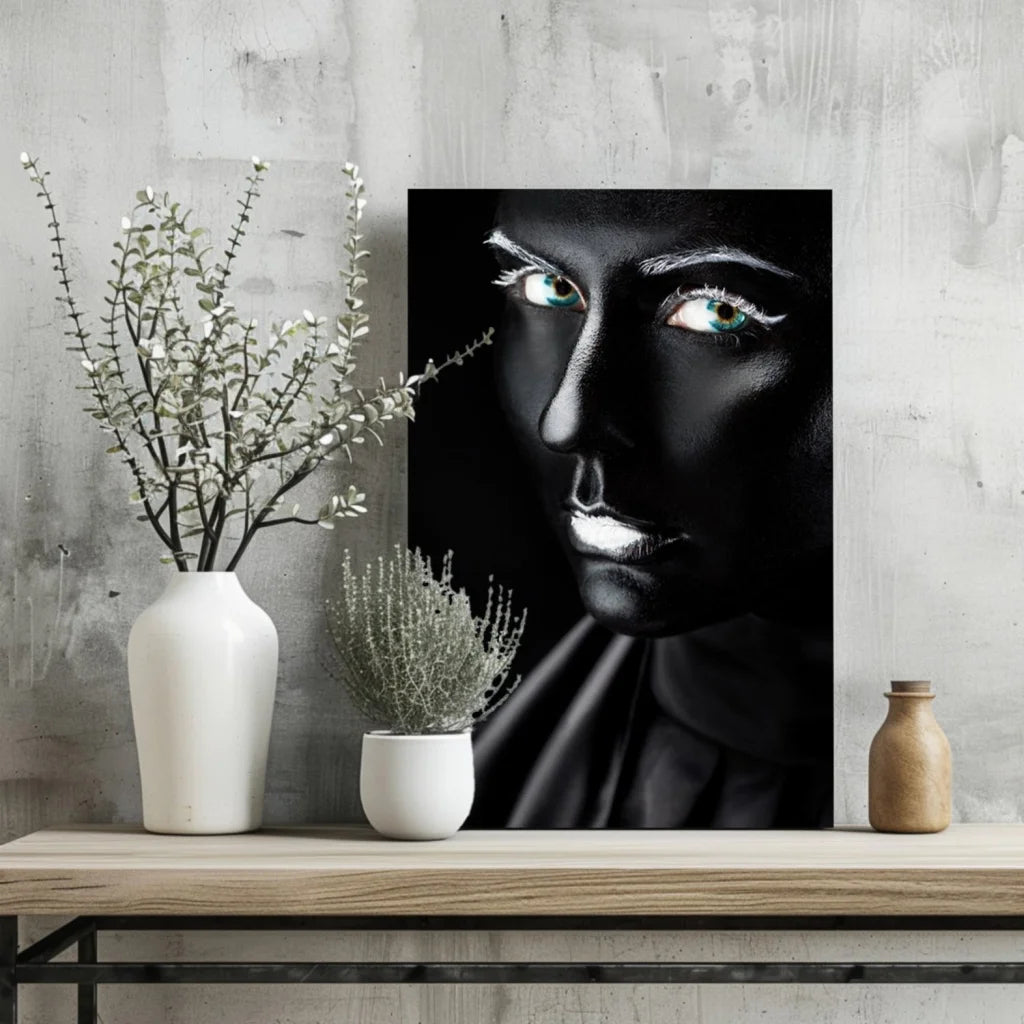 Black-and-white portrait canvas of woman with glowing teal eyes and silver lip gloss