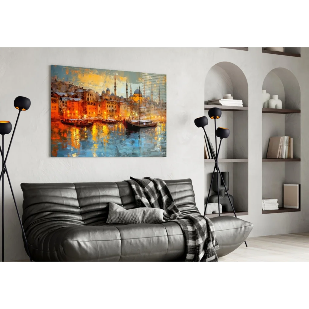 Vibrant orange blue cityscape glass wall art with reflective water above black sofa