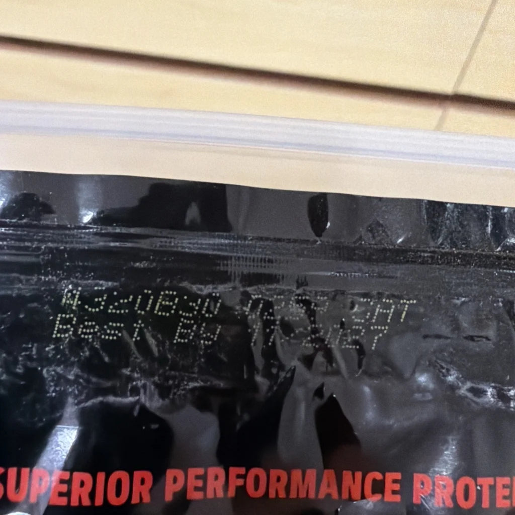 Back of GNC AMP Wheybolic Ripped Protein black bag with red superior performance text