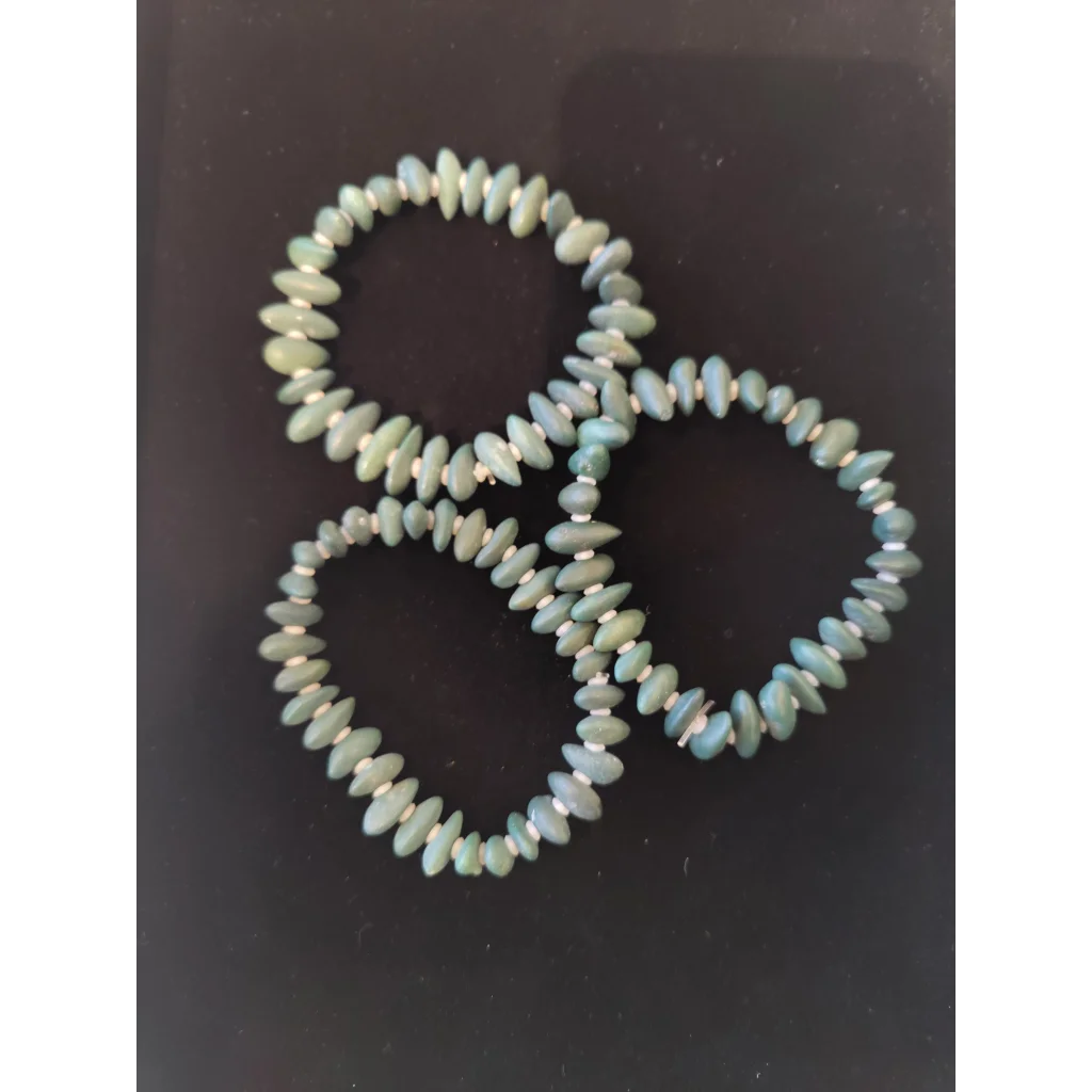 Three interlocking Gobi Desert agate bracelets with jade-like beads