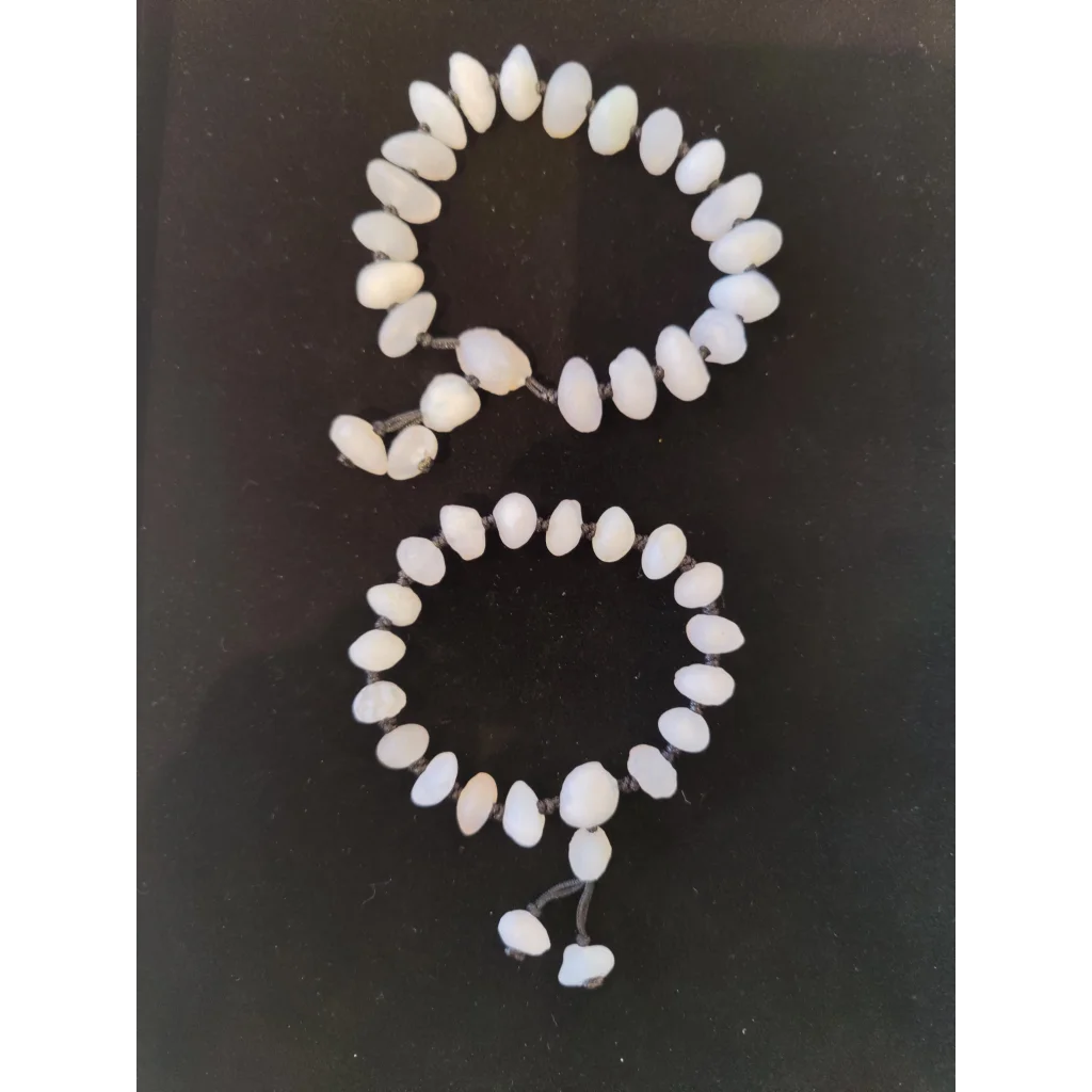 Two iridescent Gobi Desert agate oval bead bracelets, Gobi Desert, China