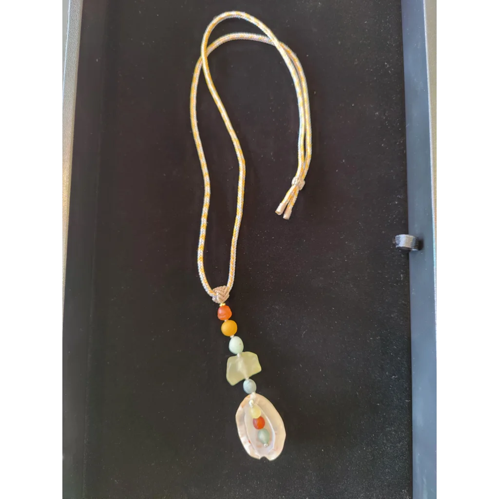 Gobi Desert agate necklace with gold cord, beads and shell pendant