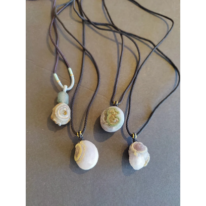 Three Gobi Desert Eye Agate black cord necklaces with polished stones