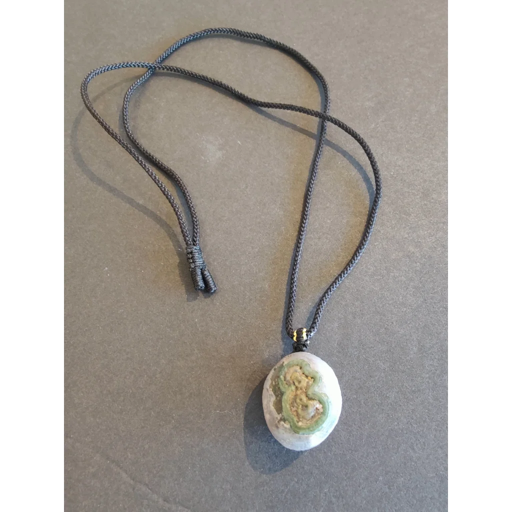 Gobi Desert Eye Agate pendant on black cord necklace with geode interior