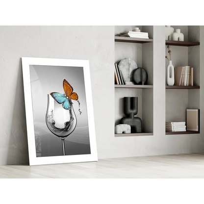 Vibrant orange and blue butterfly on glass wall art print in wine glass
