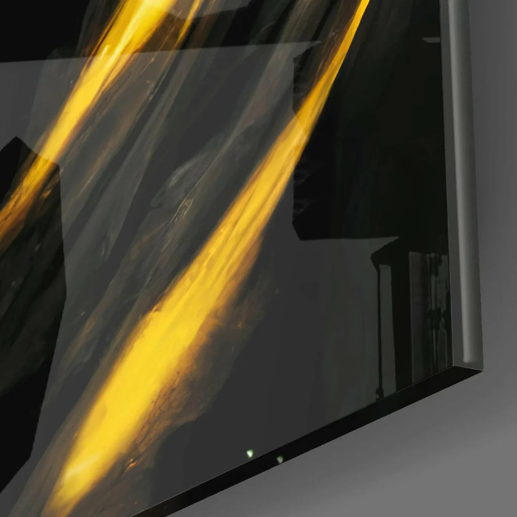 Stunning golden face glass wall art with radiant yellow streaks on glossy black background