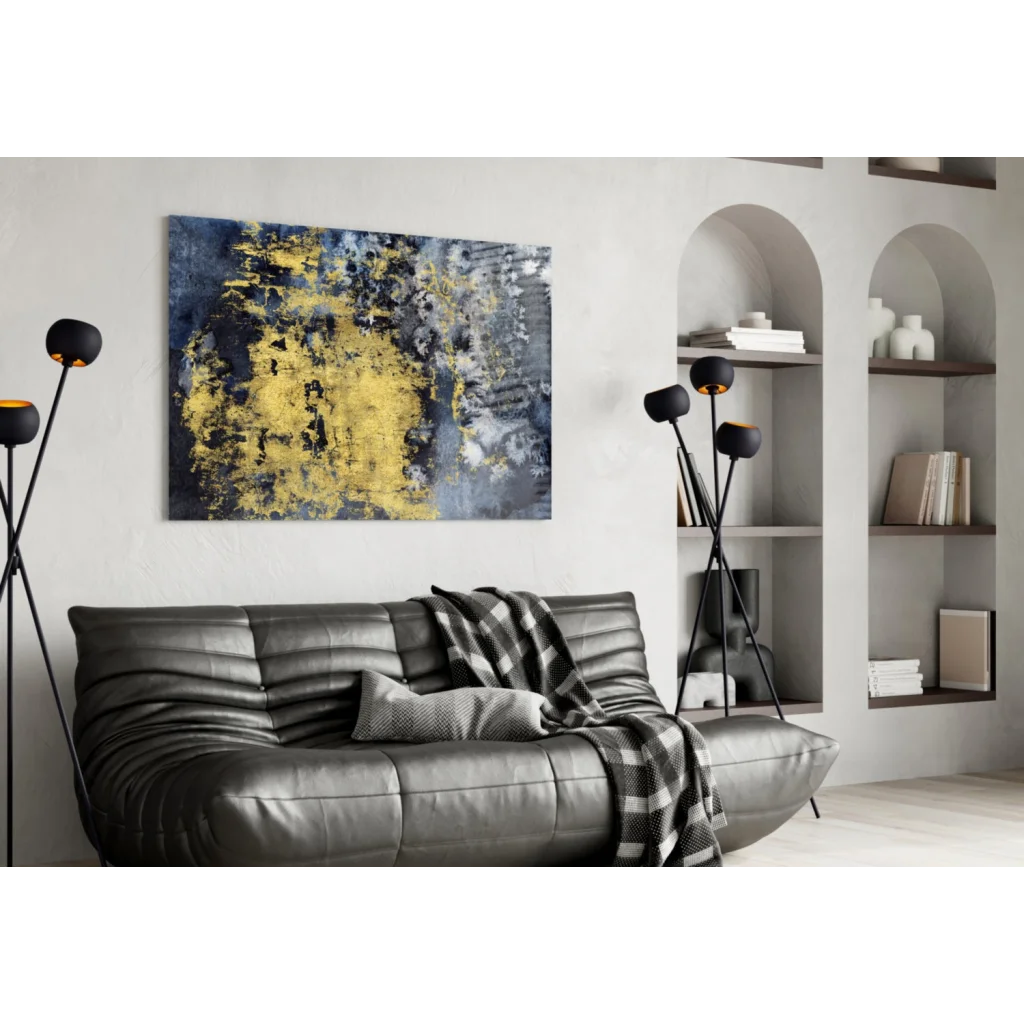 Sleek gray leather sofa with modern tufting and navy blue gold abstract wall art