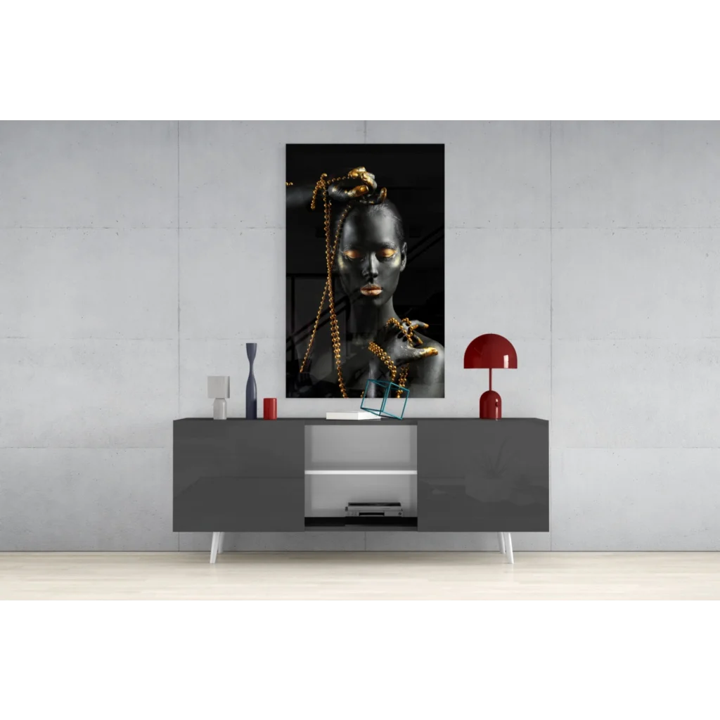 Black and gold glass wall art portrait of woman with golden chains