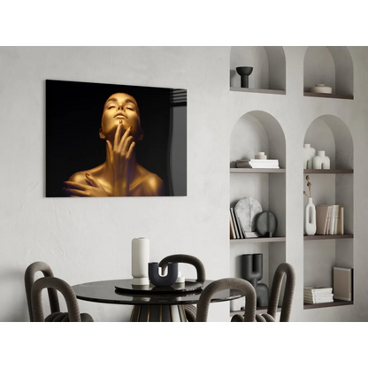 Elegant golden glow glass wall art portrait of serene woman touching face