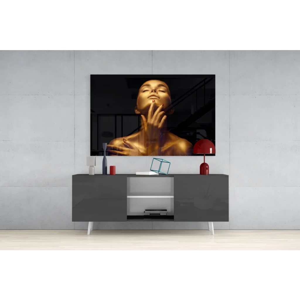 Sleek gray media console with white legs under Golden Glow glass wall art portrait