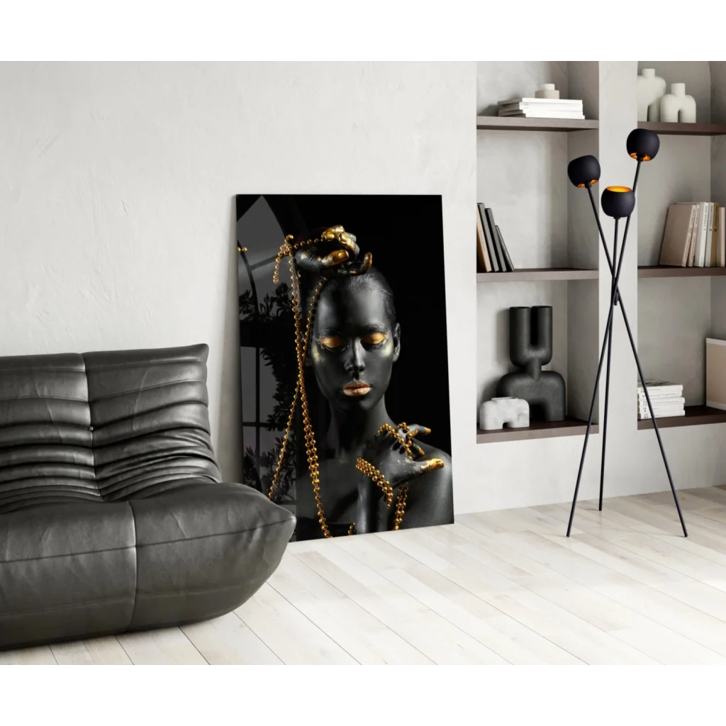 Stunning black and gold glass wall art portrait of woman with metallic makeup