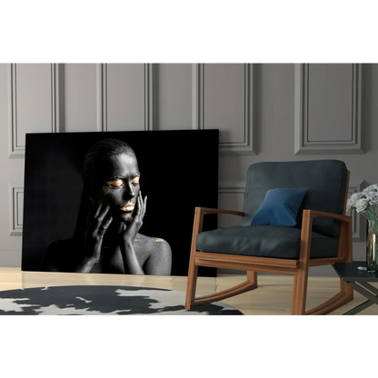 Golden Goddess black canvas wall art with woman gold eyes lips