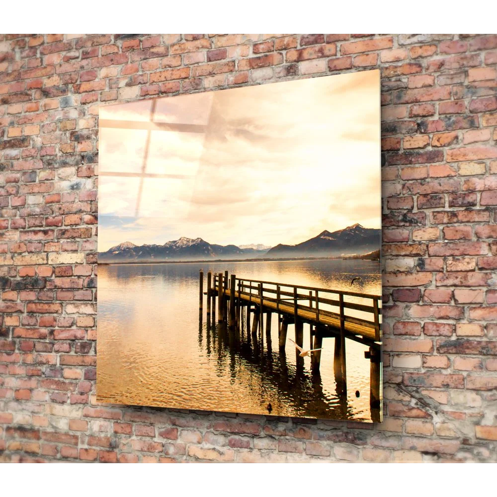 Golden Lake Pier tempered glass art with size comparison on brick wall