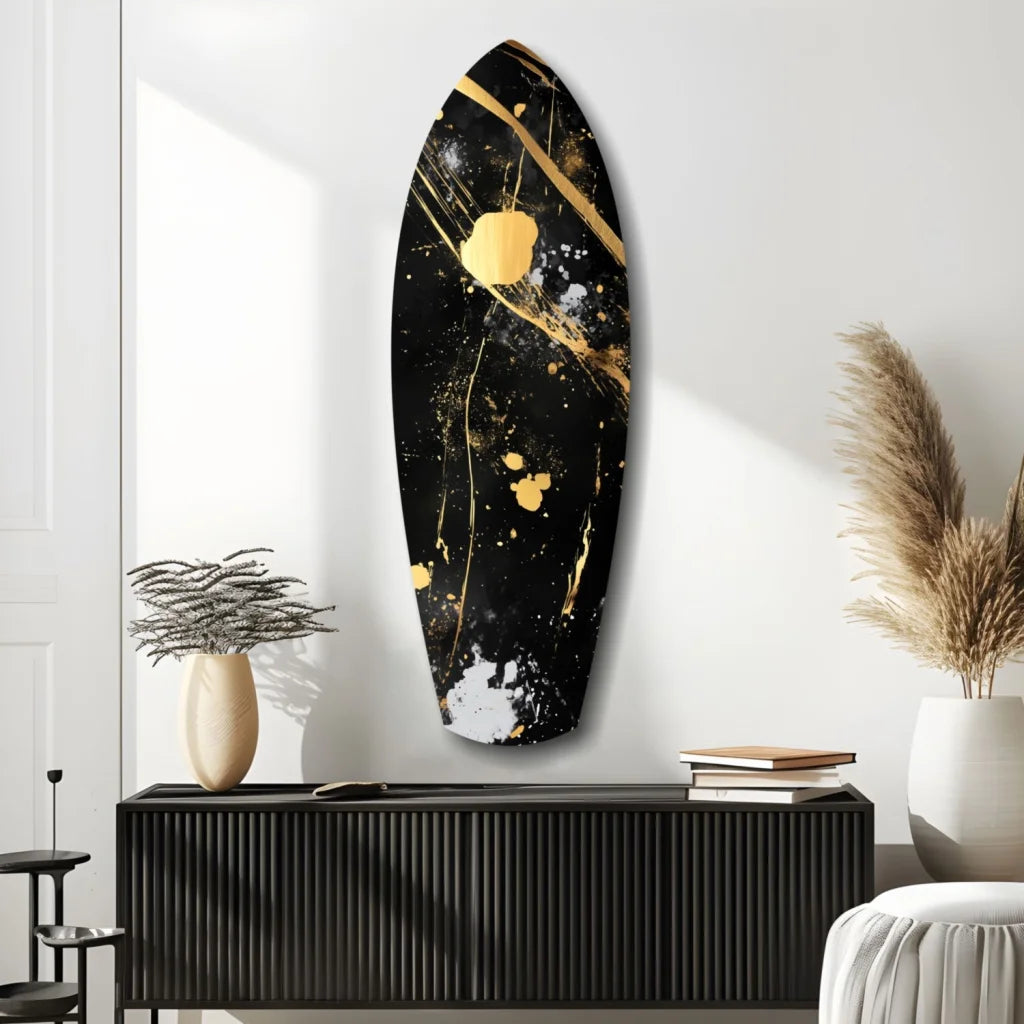 Black surfboard tempered glass art with gold and white splatter accents