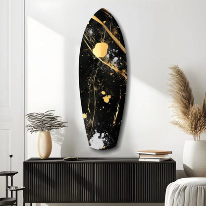 Black surfboard tempered glass art with gold and white splatter accents