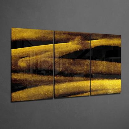 Golden Streak glass wall art triptych with bold abstract stripes