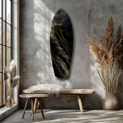 Sleek black surfboard tempered glass art with golden waves