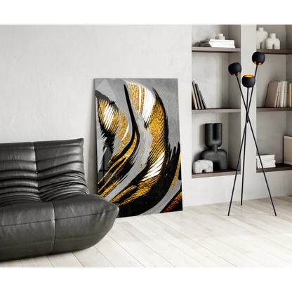 Modern abstract glass wall art with gold and black brushstrokes on gray