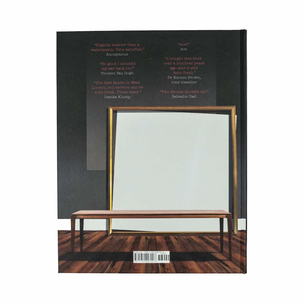 Gorillaz art book cover with empty picture frame and wooden bench artwork