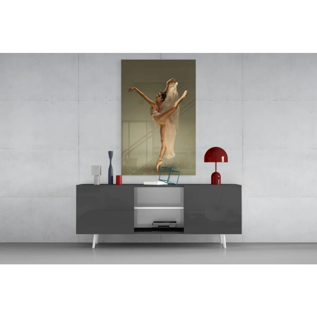 Beige canvas wall art of leaping ballerina in white tutu on gray console