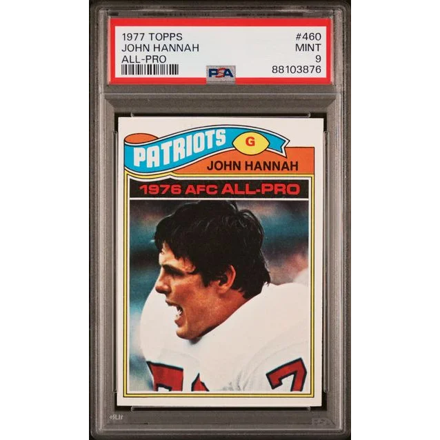 1977 Topps John Hannah All-Pro Football Card graded PSA Mint 9 on display
