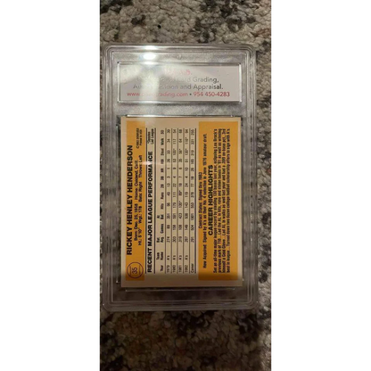 Graded Rickey Henderson baseball card in clear slab for collectors
