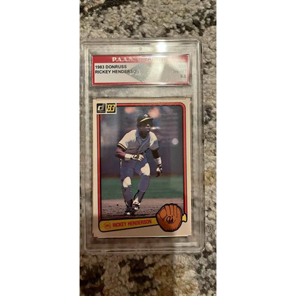 Graded 1983 Donruss Rickey Henderson card in protective slab showcasing Rickey Henderson memorabilia