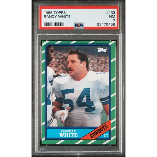 A graded NM 7 1986 Topps Randy White football card displayed in PSA packaging