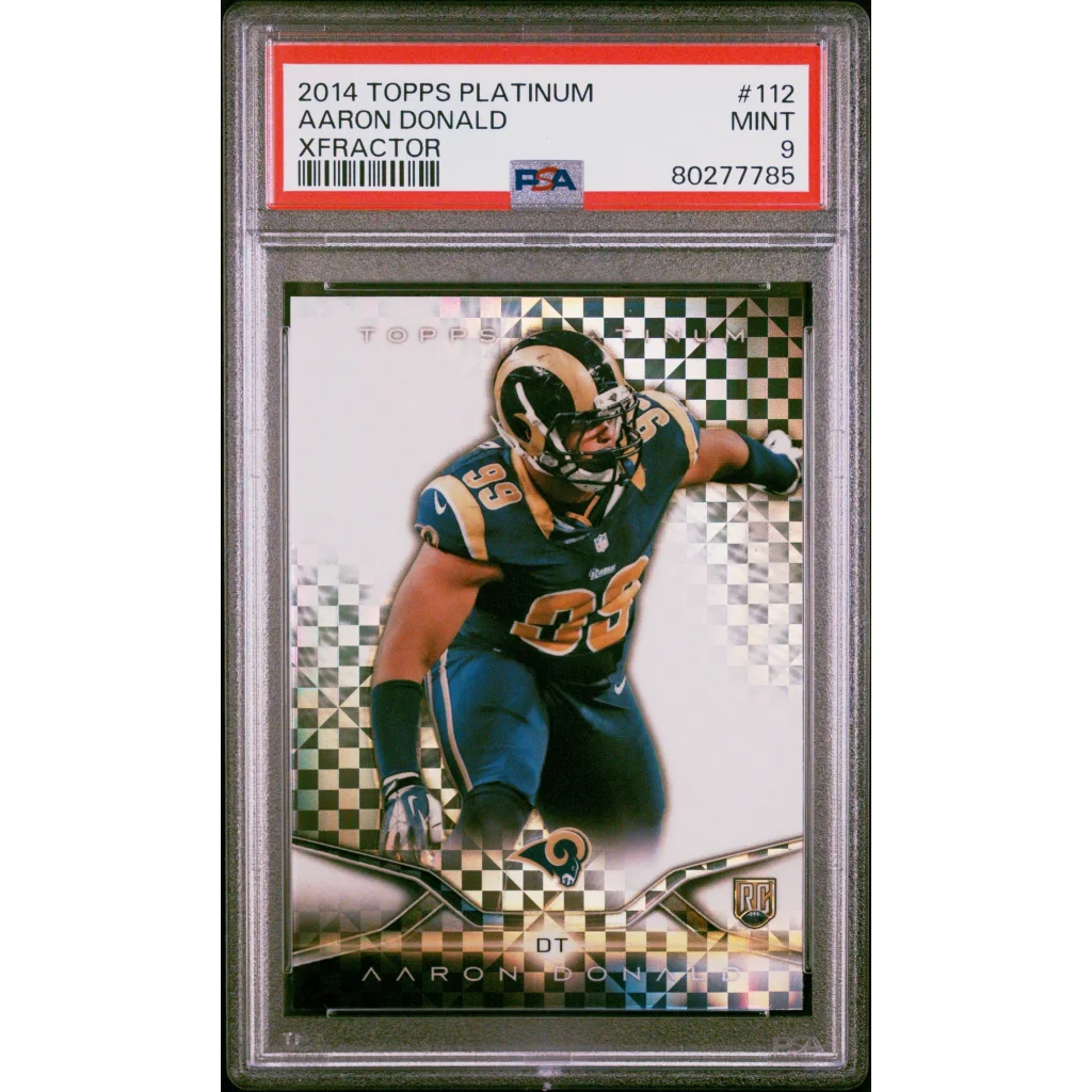 A graded 2014 Topps Platinum Aaron Donald X-Fractor football card PSA Mint 9