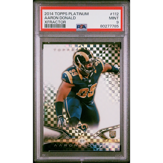 A graded 2014 Topps Platinum Aaron Donald X-Fractor football card PSA Mint 9