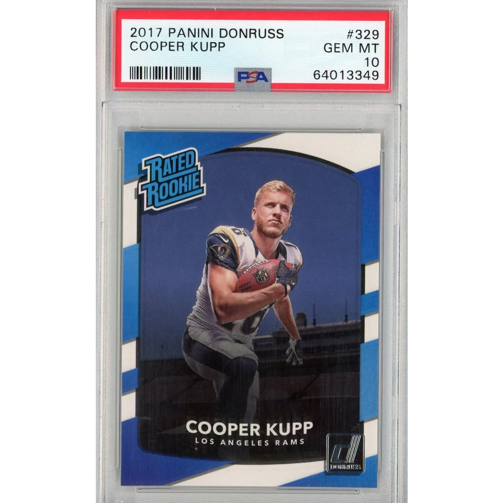 A graded 2017 Panini Donruss Cooper Kupp Rated Rookie football card in PSA case
