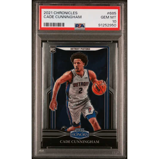 2021 Cade Cunningham Pistons rookie card graded PSA GEM MT 10 with player dribbling basketball
