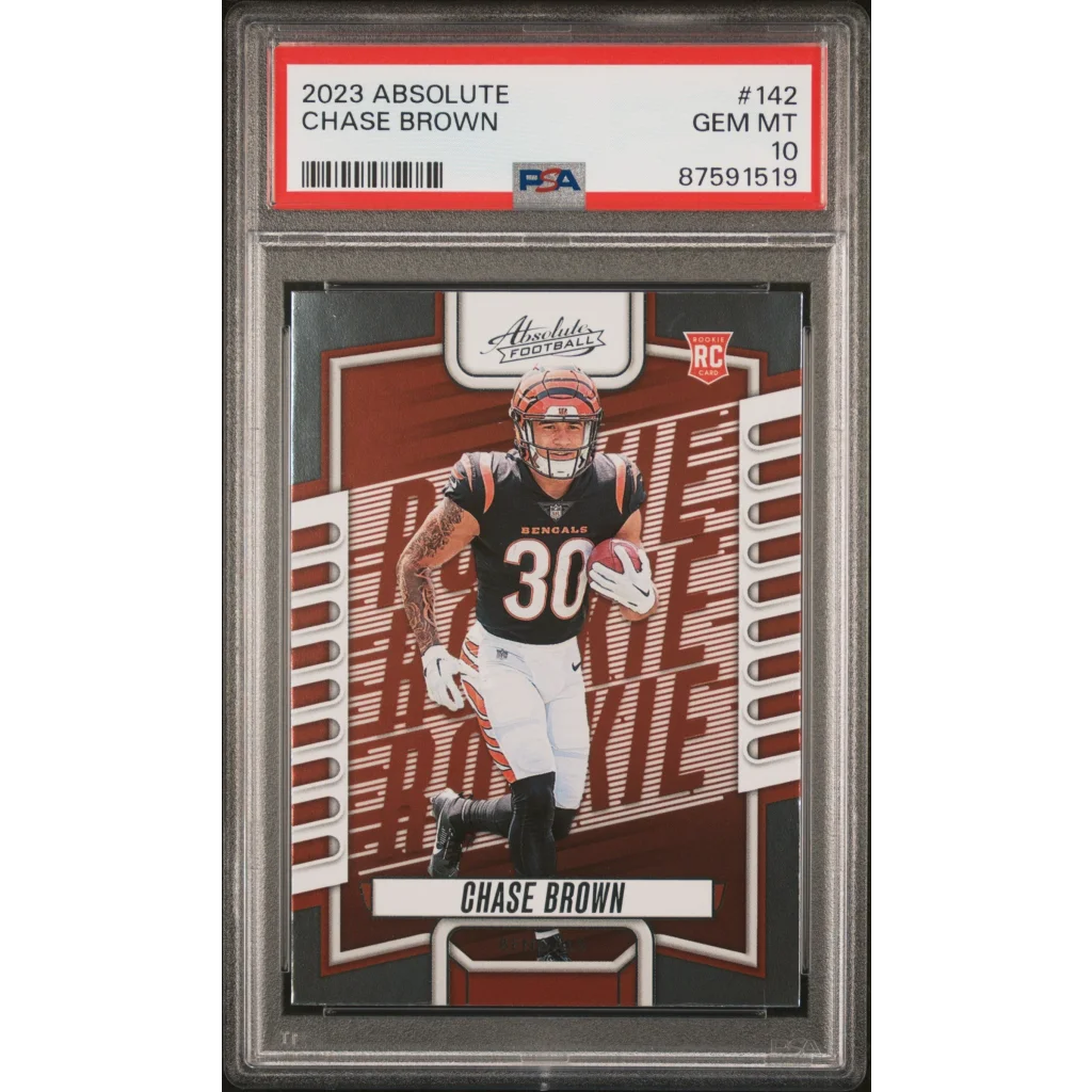A graded 2023 Absolute Chase Brown football rookie card in PSA case