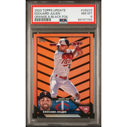 PSA graded 2023 Edouard Julien Orange Black Foil baseball card in product display