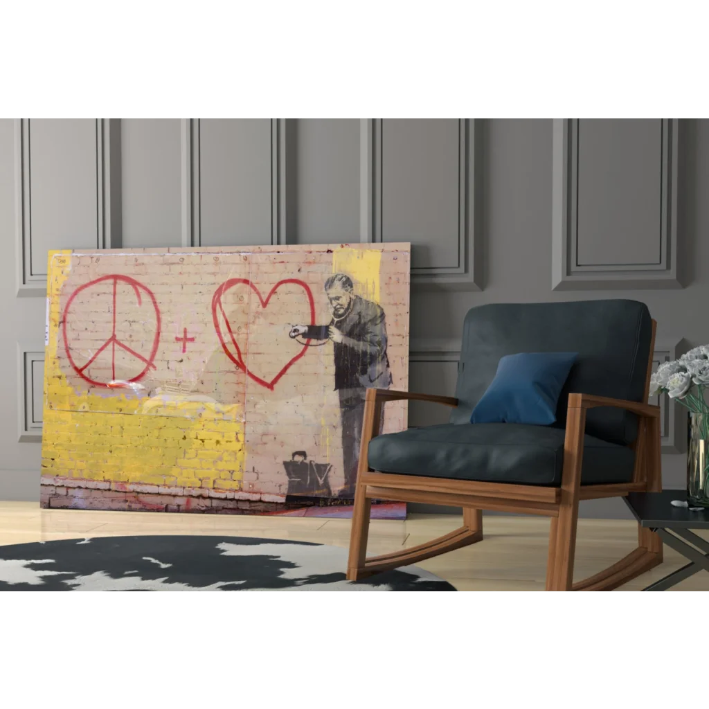 Vibrant graffiti glass wall art with red peace symbol and heart on yellow brick backdrop