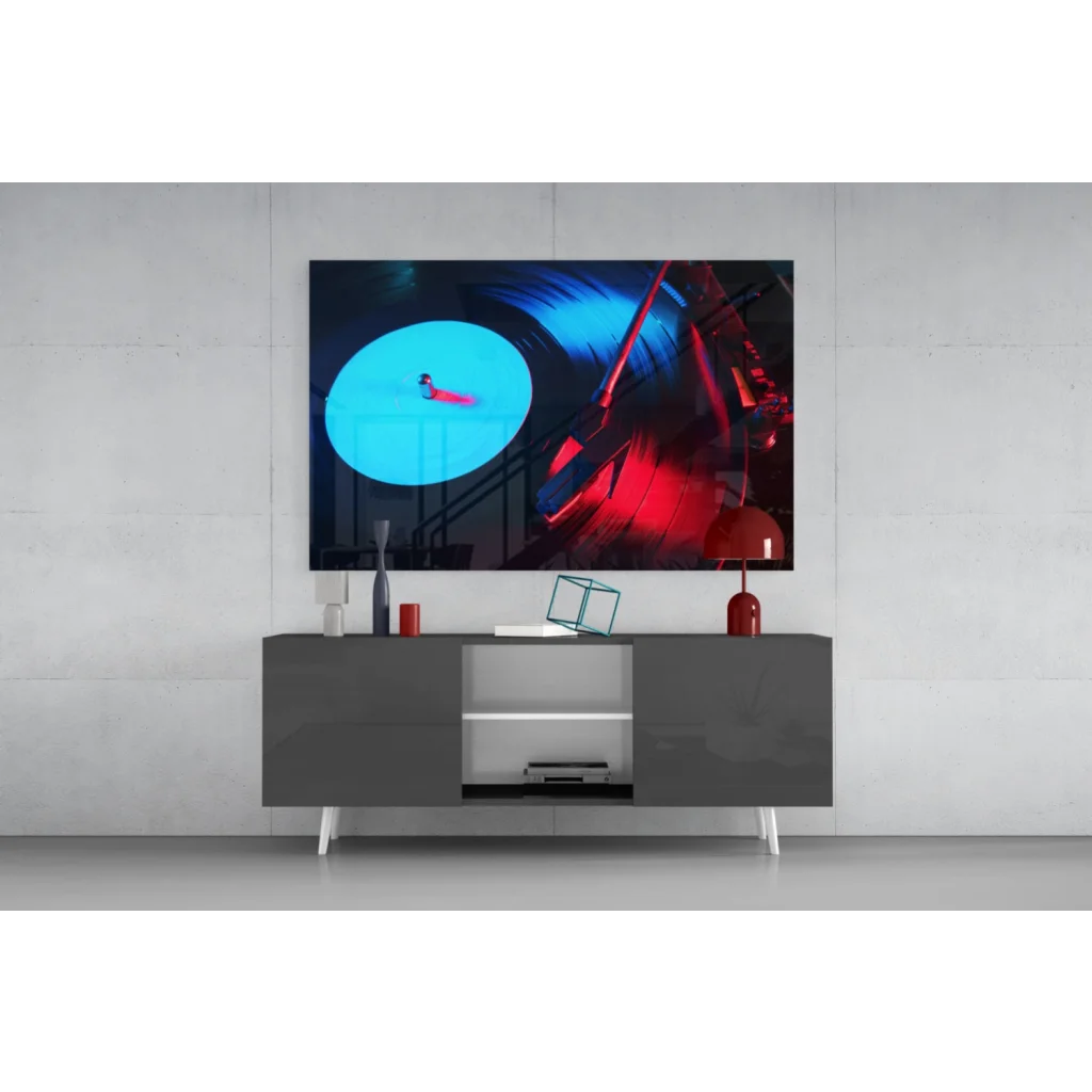 Sleek gray media console with white legs under Neon Vinyl Record glass wall art