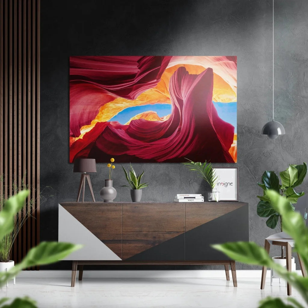Vibrant abstract canvas of swirling red, orange, blue rock formations on brushed aluminium dibond wall art