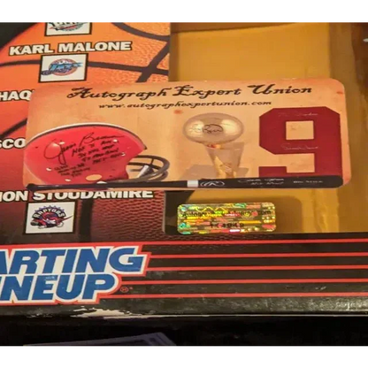 Sports memorabilia display with Grant Hill auto signed backboard and signed gear