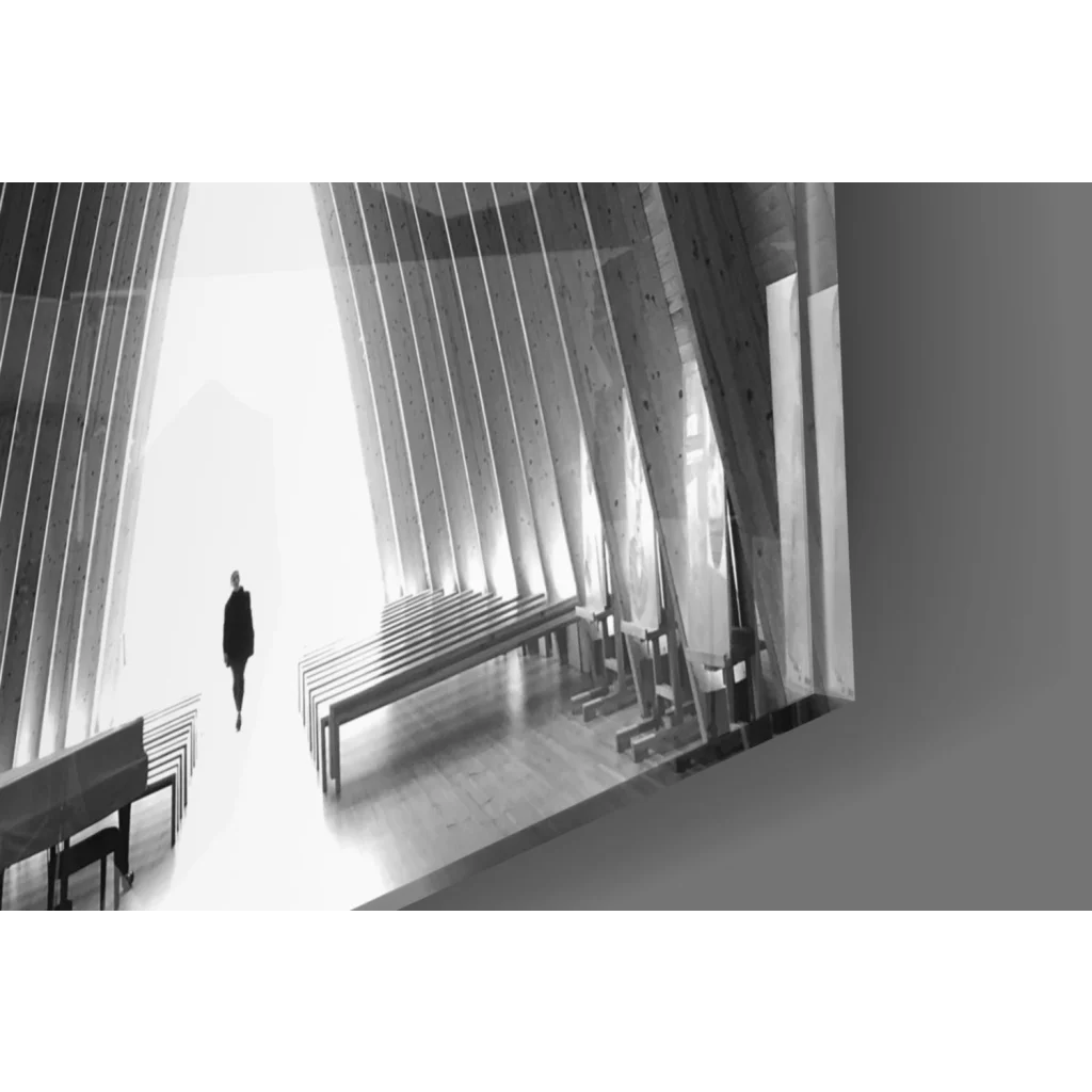 Solitary figure in dark clothes walks modern church with arched beams glass wall art