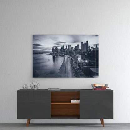 Black-and-white city skyline glass wall art print with bridge over water